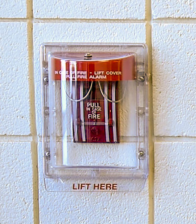 A red fire alarm on campus