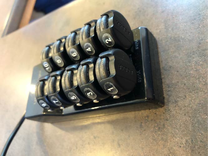 Fitness monitor sitting in charger