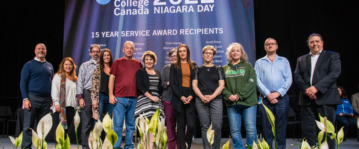 Staff receiving their 15 year service award