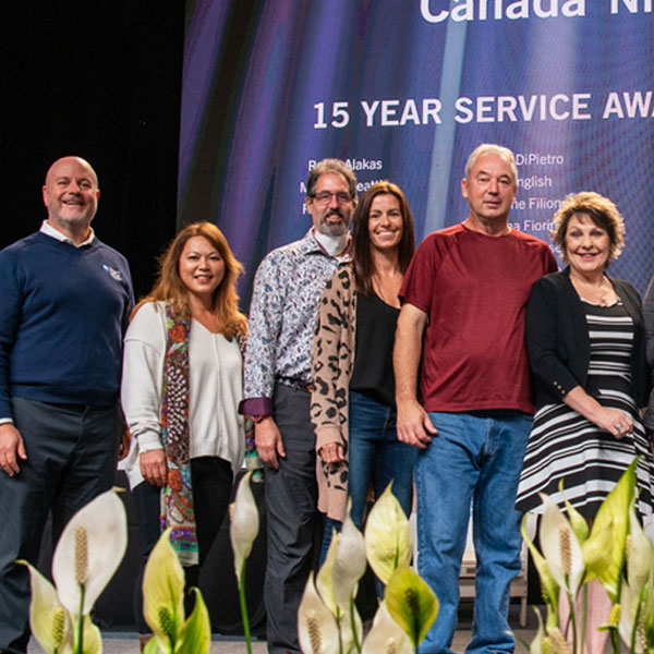 Staff receiving their 15 year service award