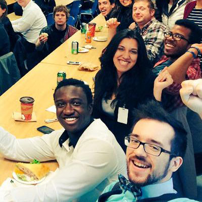A selfie of a group of students at a table