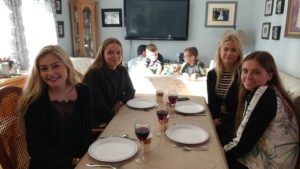 Danish students enjoy Thanksgiving dinner at their homestay with the Letourneau family on October 9.