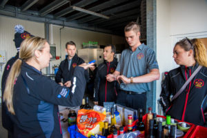Team members taste local ingredients at Stranzl kitchens on October 18.