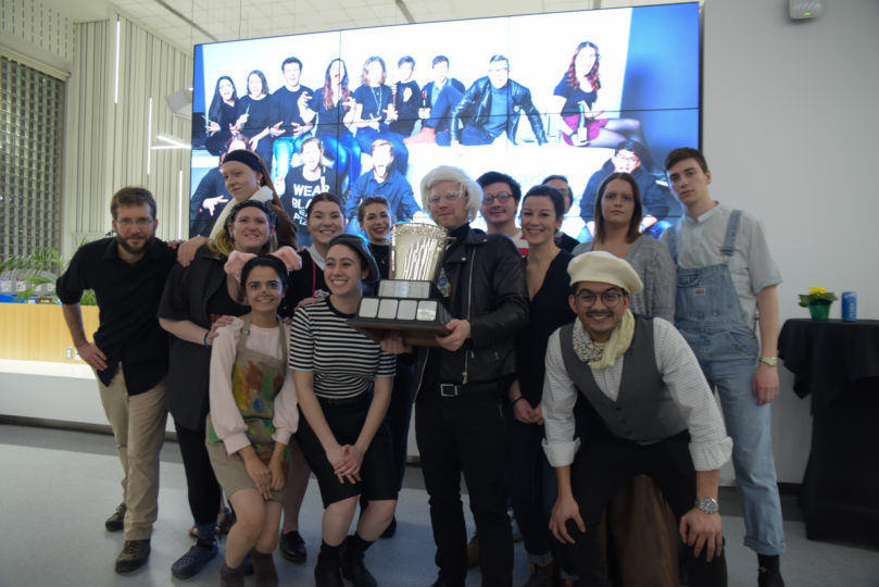 Team Wine cheers to their victory at 13th Caps, Corks and Forks InsideNC