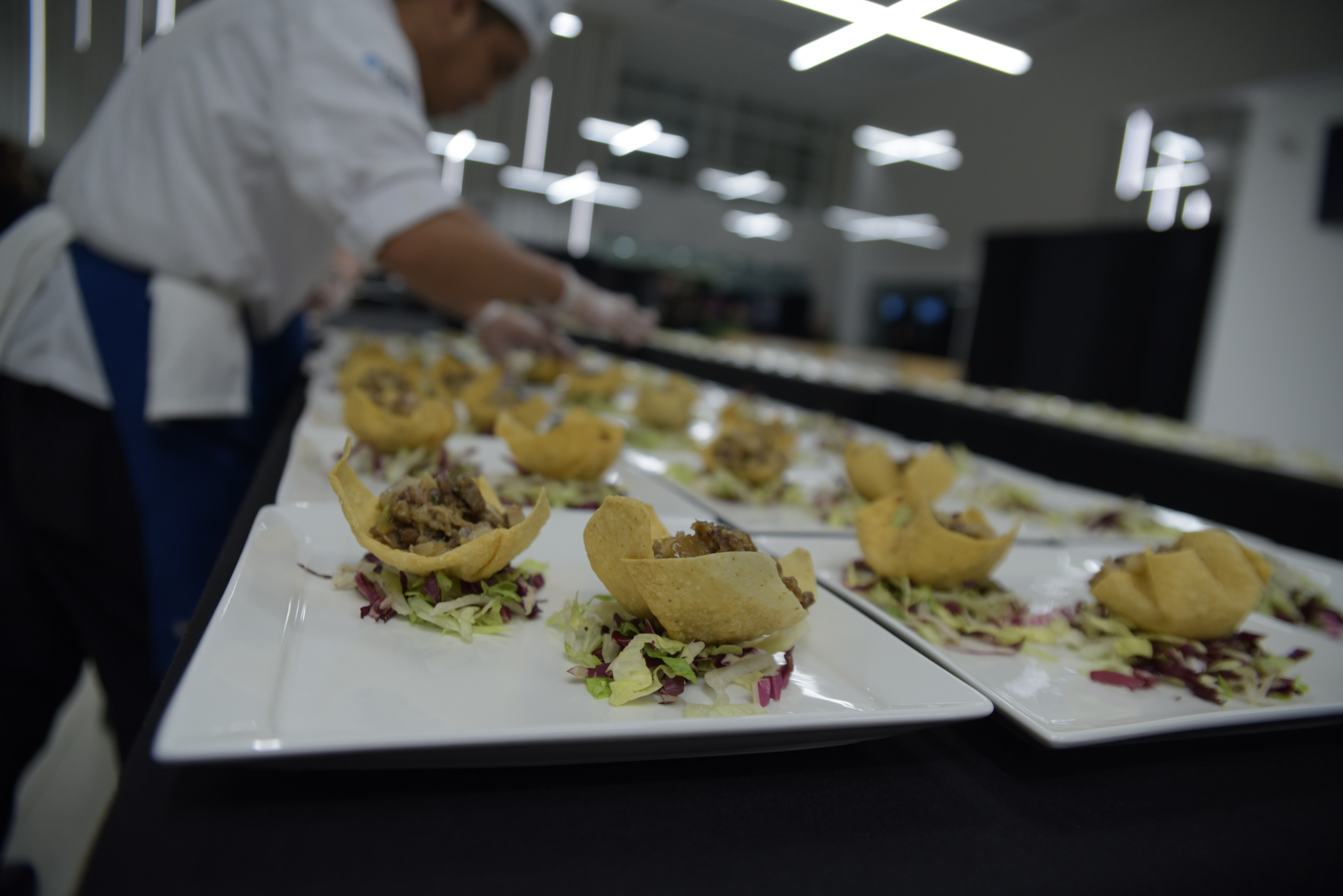 Team Wine cheers to their victory at 13th Caps, Corks and Forks InsideNC