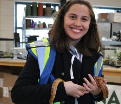 Maria-Jose-Torres-Vargas-2019-Bioblitz-holding-snakes-resize-e1615987670572.jpg