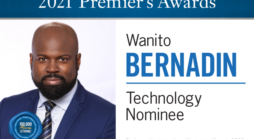 a head shot of a black man wearing a blue suit and striped tie; the words 2021 Premier's Awards Wanito Bernadin Technology Nominee Business Administration - Marketing (Co-op), 2003 appear on the image