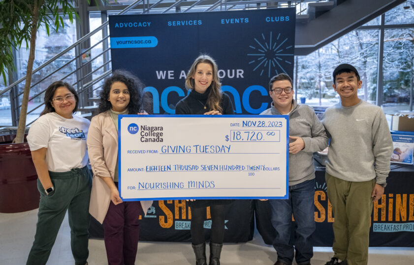20231206_Giving_Tues_Cheque_NCC_2241-scaled.jpg