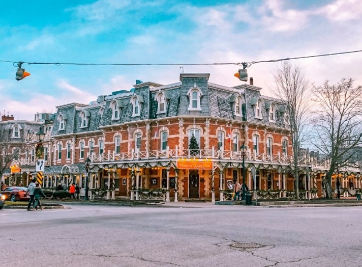 Outdoor building on corner of a street.