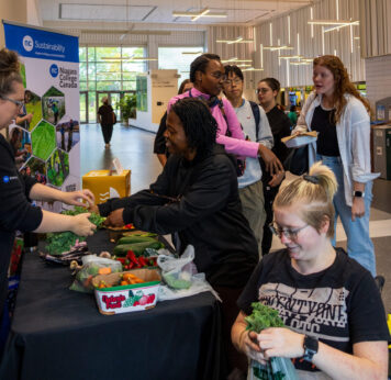 Students picking out produce vertical