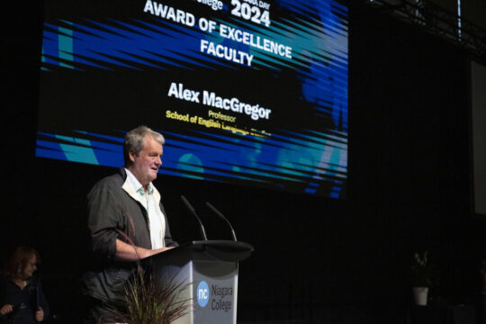 Alex-MacGregor-AOE-award.jpg