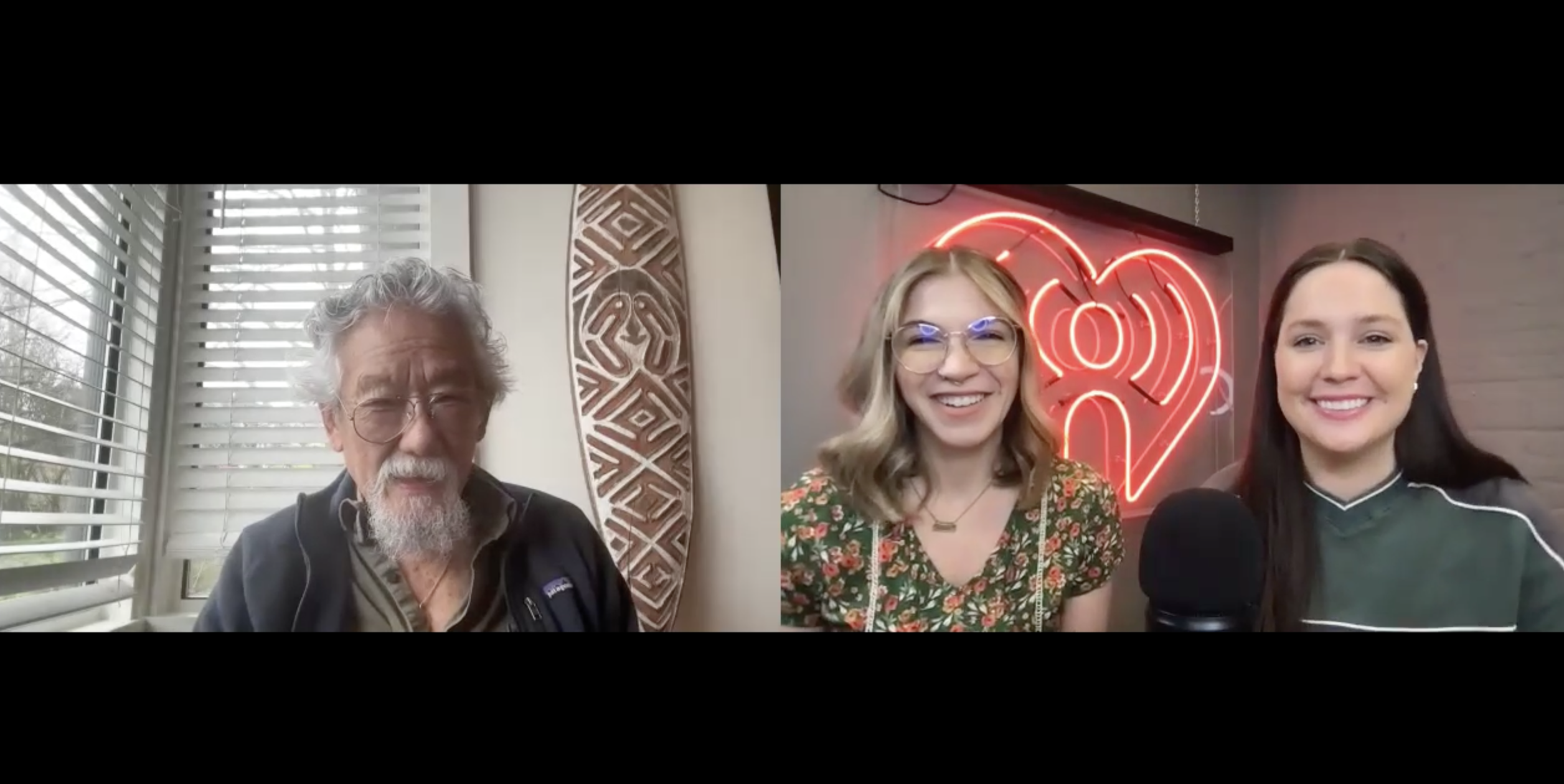 a screen shot of two female radio hosts interviewing an older man