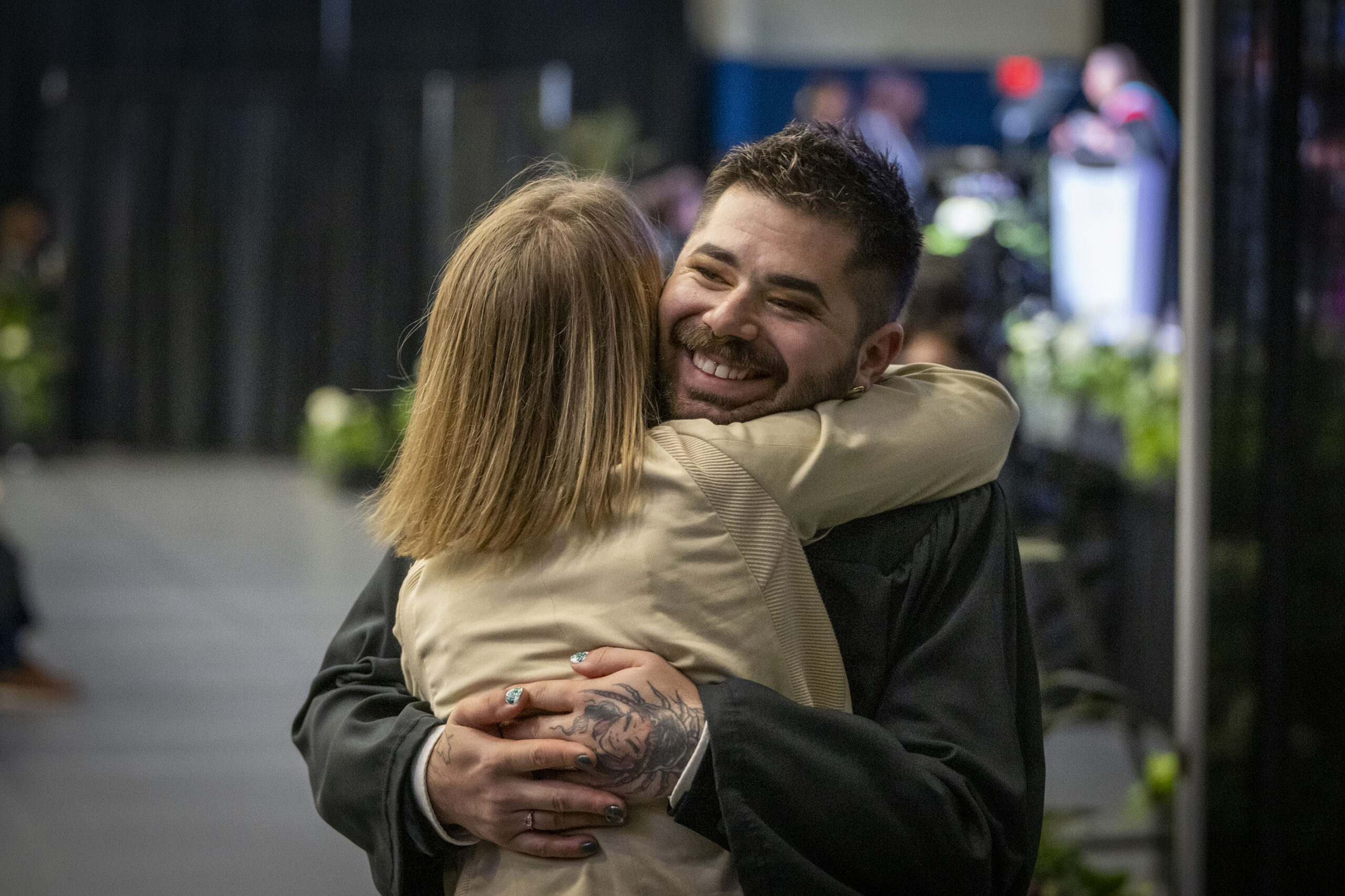 two people embrace for a hug