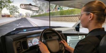 Student at the wheel in a driving simulator