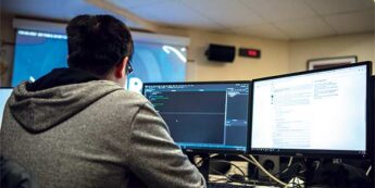 Student coding in a gaming lab.