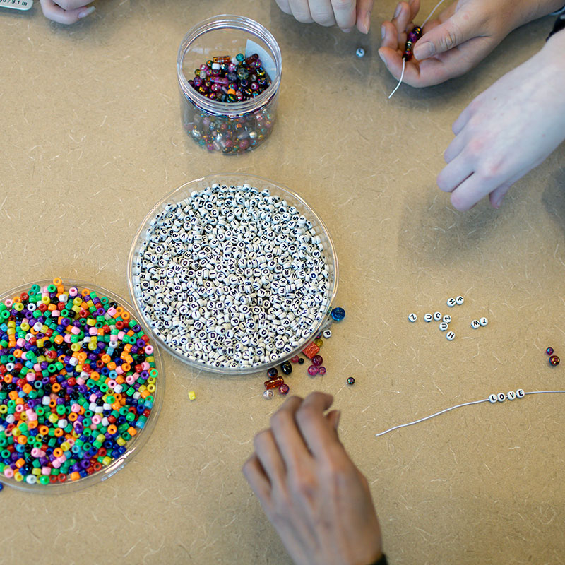 Top down view of table top with beads