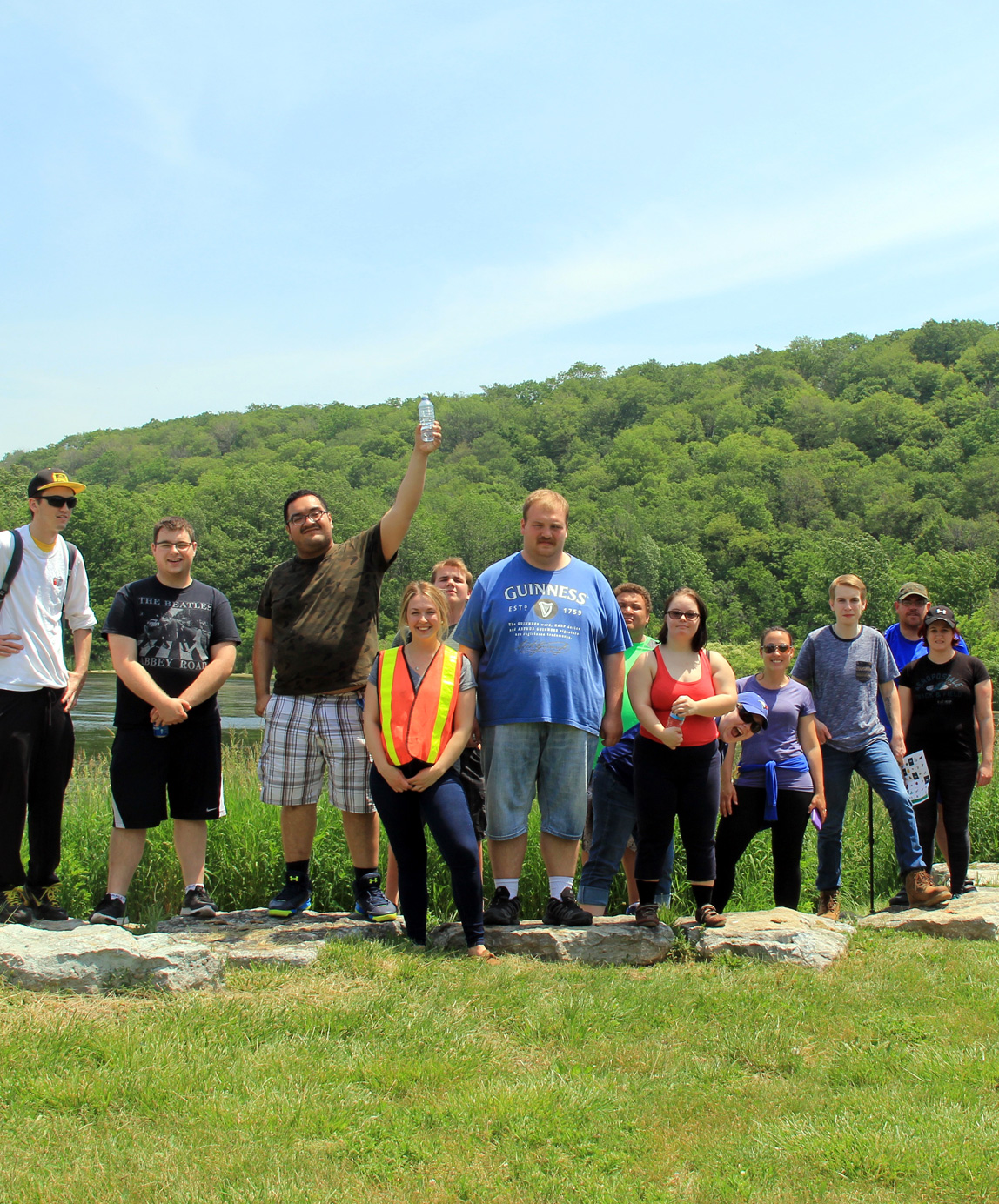 Students standing in a group in front of the wetlands and Niagara Escarpment
