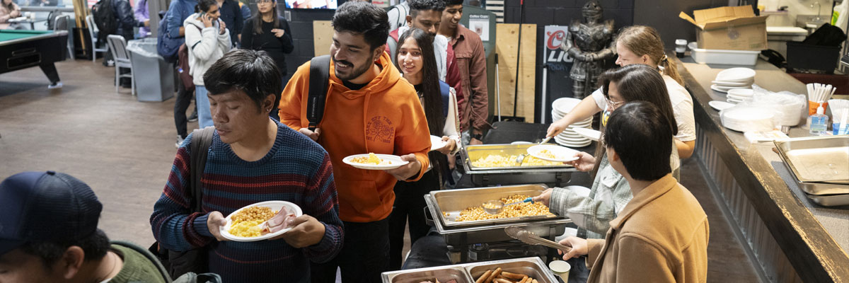 NC students queue up to receive free breakfast courtesy of NC SAC