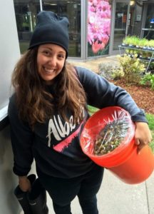 Brewmaster student Lauren Zimbalatti, prepares her Belgian Saison blended with Kombucha which will be on tap at the Project Brew December Market. She is pictured with hops grown at Niagara College. 